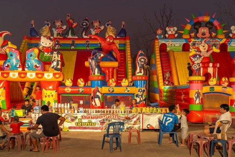 Market and amusement park in the evening in Luang Prabang, Laos, Asia