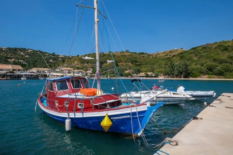 Agios Stefanos Avliotes, Corfu, Greece, Fishing boats in the harbour of Agios Stefanos. Agios