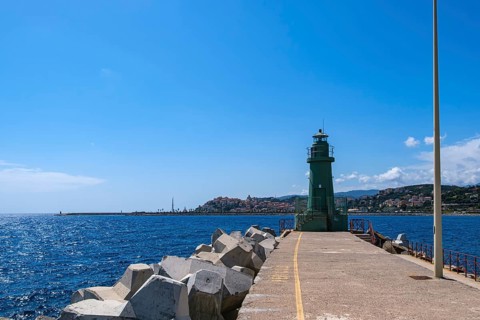 Eastern lighthouse, Faro Molo di Levante, at the end of the Long Pier in the Oneglia district of