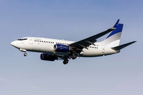 A Boeing 737-700 aircraft of Lumiwings inXaero with the registration SX-LWC at Corfu Airport,