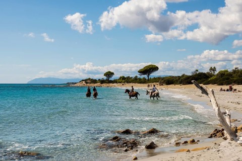 Lonely beach and riders, Spiaggia di Biderosa, Riserva Biderosa nature reserve, Orosei, Nuoro