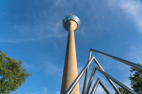 Rhine Tower television tower and energy pyramid on the banks of the parliament, state capital