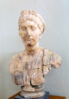 Carved marble portrait of aristocratic Roman woman in archaeology museum, Apollonia Archaeological