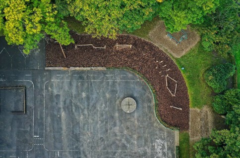 Mülheim an der Ruhr, North Rhine-Westphalia, Germany - Schoolyard unsealing, view from above of the