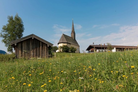 View of the church St. Nikolaus, flower meadow, Einsiedl, Inzell, Bavaria, Germany, Europe