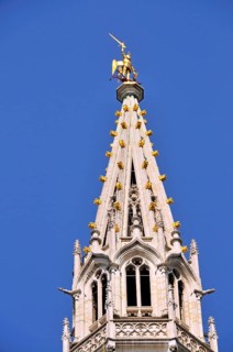 Gilded statue of the Archangel Michael fighting the dragon, the patron saint of the city of
