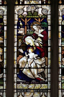 Church of Saints Peter and Paul, Pettistree, Suffolk, England, UK stained glass window birth of