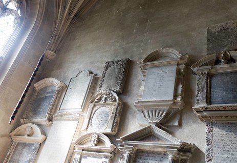 Wall mounted historic grave memorials Interior of church of Saint Bartholomew, Corsham, Wiltshire,