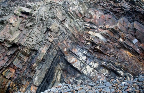 Complex folding of sedimentary rock strata in coastal cliffs at Hartland Quay, north Devon,