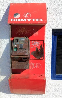 Old disused broken Comytel public telephone booth phone, Almeria, Spain, Europe