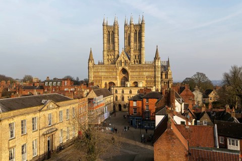 West frontage of Lincoln cathedral church viewed from castle walls, city of Lincoln, Lincolnshire,