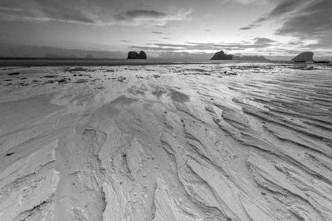 Structures in the sand, sunrise at low tide on the beach of Koh Ngai Island, Andaman Sea, Satun