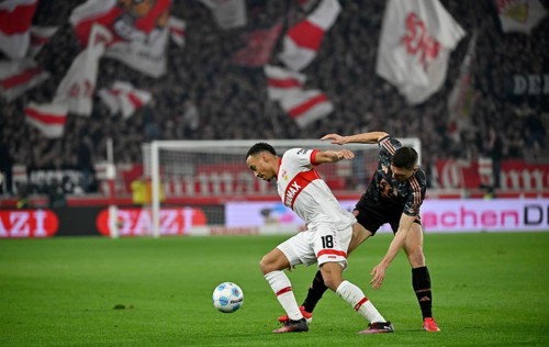 Duel, action Jamie Leweling VfB Stuttgart (18) against Joao Palhinha FC Bayern Munich FCB (16)