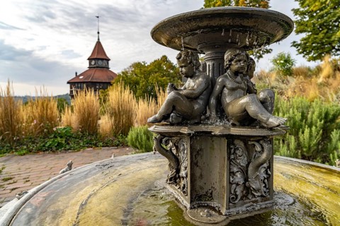 Castle fountain and the thick tower of the castle town fortifications in Esslingen am Neckar,