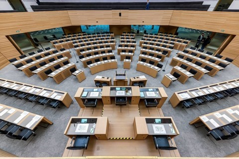 State parliament of Baden-Württemberg. Empty plenary hall, state coat of arms. Stuttgart,