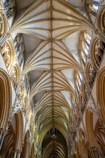 Vaulted nave ceiling roof of medieval Lincoln cathedral interior, city of Lincoln, Lincolnshire,