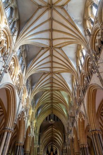 Vaulted nave ceiling roof of medieval Lincoln cathedral interior, city of Lincoln, Lincolnshire,