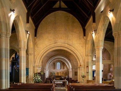 Norman chancel architecture inside church of Saint John the Baptist, Devizes, Wiltshire, England,
