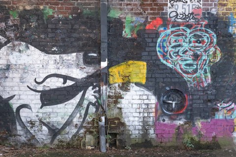 Grafitti under the city railway bridge at Linderner harbour, lock, canal, reflection, Limmer,