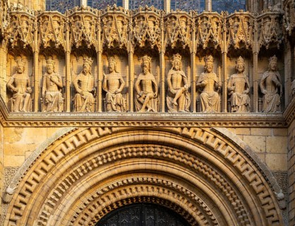 Carved stonework figures of kings, Gallery of Kings, frontage of cathedral church, Lincoln,