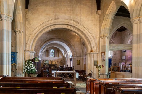 Norman chancel architecture inside church of Saint John the Baptist, Devizes, Wiltshire, England,
