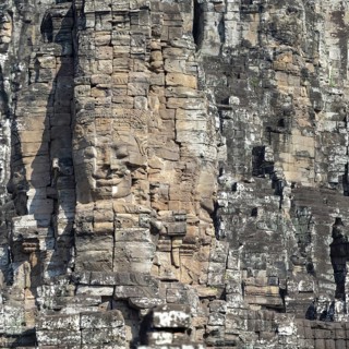 Giant stone-carved face of the Bodhisattva Lokeshvara, also known as Avalokiteshvara, Bayon Temple,