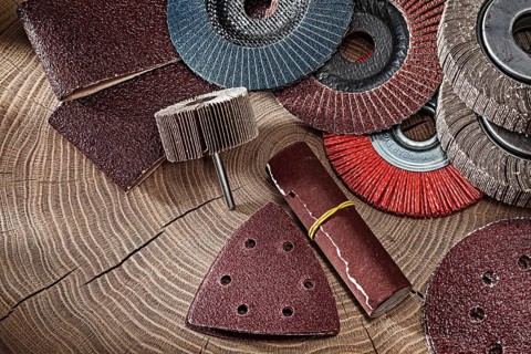 Abrasive Tools Set On Wood Background