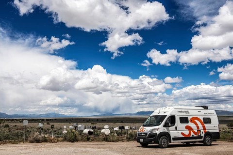 Letterboxes, mailboxes, cumulus clouds Highway 50, Loneliest Road in America, Ely, Nevada, USA,