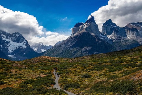 Trekker in front of the Cuernos del Paine, Torres del Paine National Park, Patagonia, Chile, South