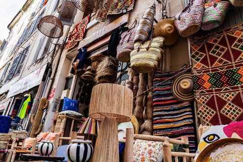 Shop exterior, lamps, carpets, baskets, Noailles, oriental neighbourhood in Marseille, France,