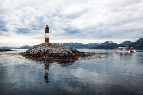 Lighthouse Les Eclaireurs with excursion boat, Beagle Channel, Ushuaia, Argentina, South America