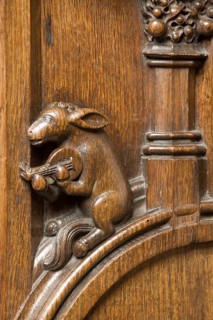 Choir stalls, drolleries on the stall sides with proverbial depictions, 1493 by Johannes Gruter