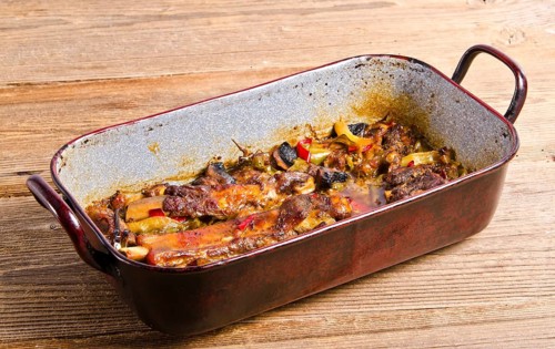 Roasted ribs in old frying pan