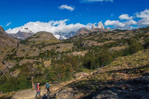 Trekkers at Cascada Martin with a view of the Fitzroy Massif, El Chaltén, Los Glaciares National
