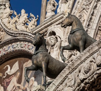 Italy Venice St Mark's Basilica -506 on the gallery of the west façade two of the bronze horses