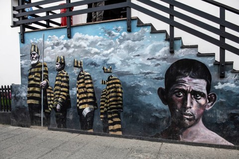 Mural with convicts from the historic Presidio prison in Ushuaia, Argentina, South America
