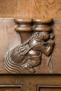 Choir stalls, drolleries on the stall sides with proverbial depictions, 1493 by Johannes Gruter