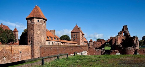 East side from the south with ruined and reconstructed buildings