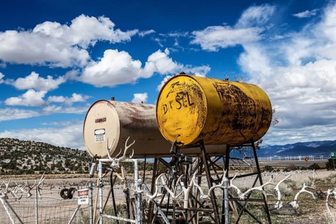 Truck stop with oil barrels and a fence of deer antlers, Highway 50, Loneliest Road in America,