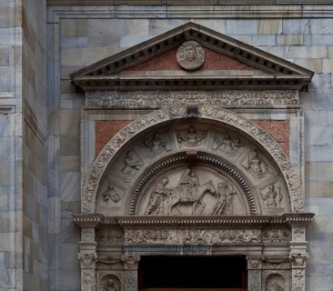 Italy Como Cathedral Gabled south portal c. 1500 by Jacopo and Tommaso Rodari in the tympanum