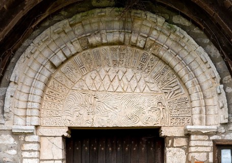 Portrait, Saint-Martin church from the 10th century (?) West portal, tympanum with labyrinth and