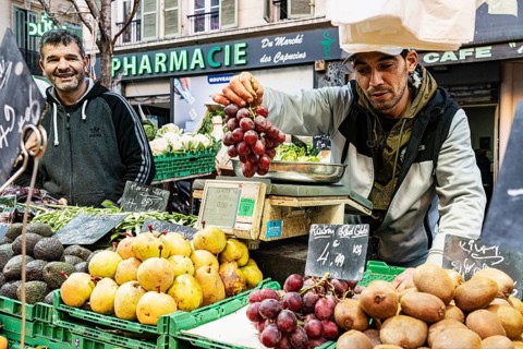 People selling fruit and vegetables, market in Noailles, Marseille