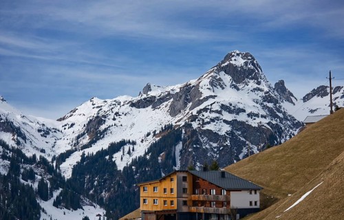 Landscape with large house in the foreground, Bregenzerwald, Vorarlberg, Austria, Europe