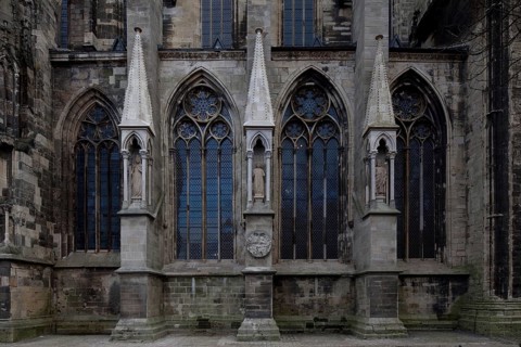 North façade of the three western nave bays with buttressed canopies restored in 2011, St., Sankt,