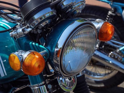 Blue retro motorbike with chrome headlight and orange indicators, Appelhülsen, münsterland, germany