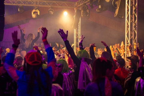 The audience raises its hands in a joyful mood at a concert, carnival, Schlagerkuchen Donzdorf,