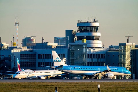 KLM Cityhopper aircraft on the taxiway, apron of Düsseldorf International Airport, old air traffic