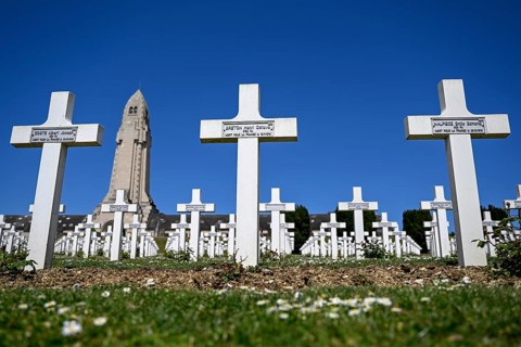 Cemetery of soldiers killed in the First World War, in the background the ossuary of Douaumont,