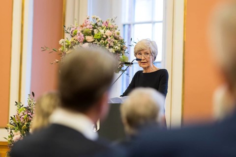 Friede Springer gives a speech of thanks after being awarded honorary citizenship at the Rotes