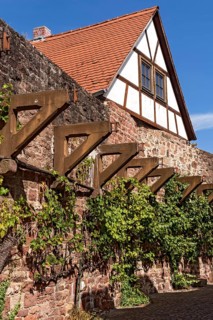 Reconstructed brackets made of concrete, support for battlements on town wall from the Middle Ages,